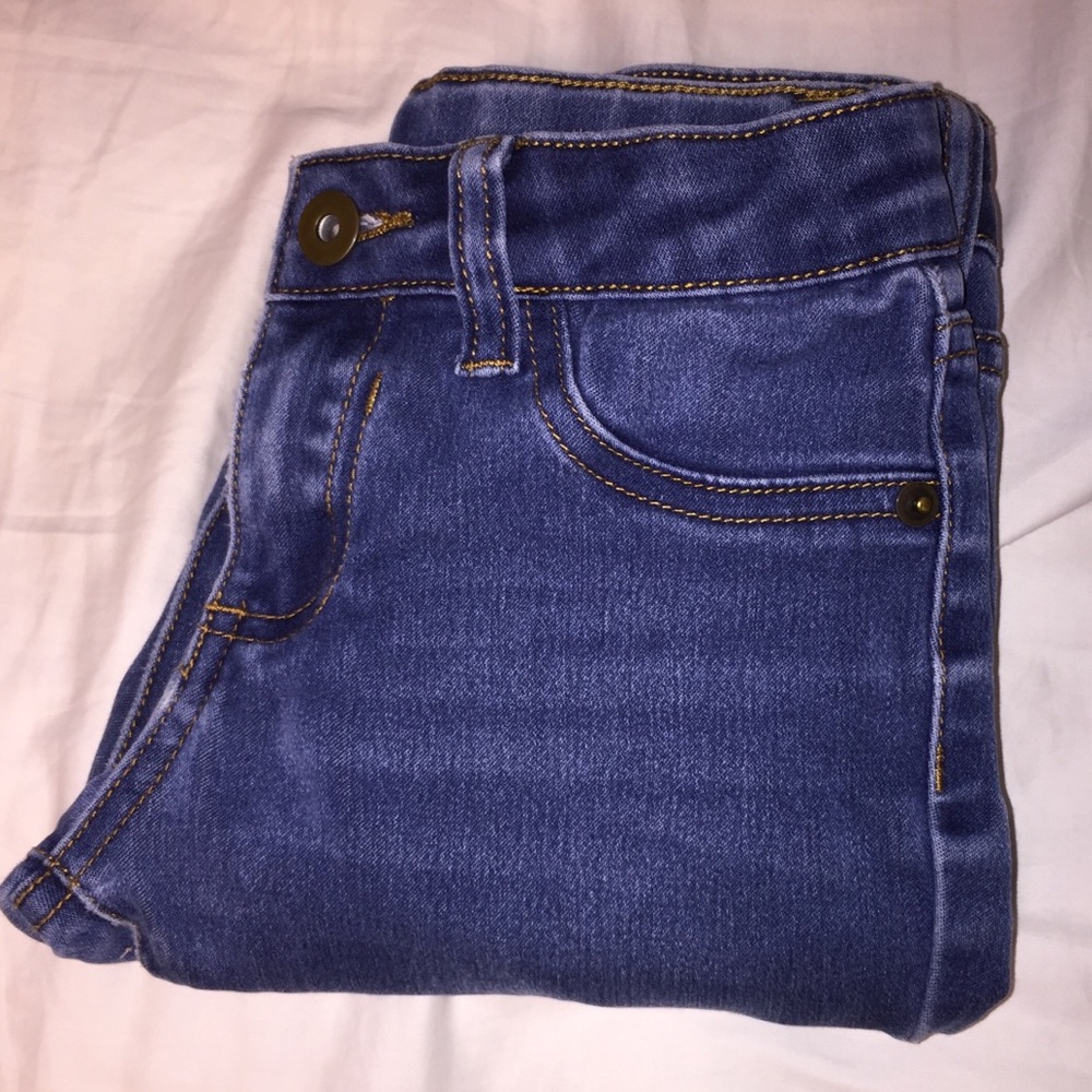 Slightly Distressed Denim Skinny Jeans